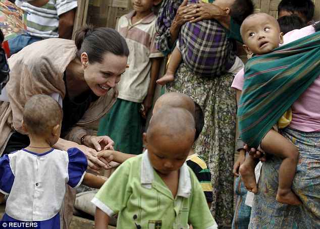 Mission: Between now and Saturday, when she leaves Burma, Mrs Jolie Pitt will also visit members of the political opposition, who have been severely oppressed over the years, and refugees